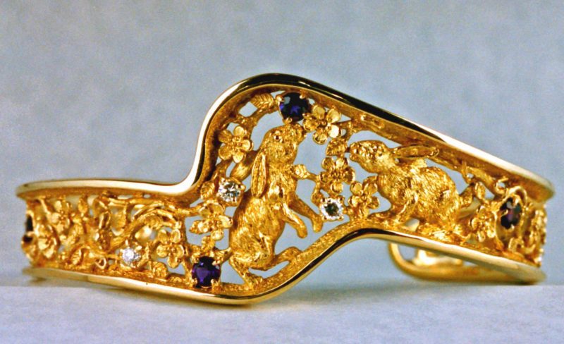 Bunny cuff bracelet with sapphires in 18K gold