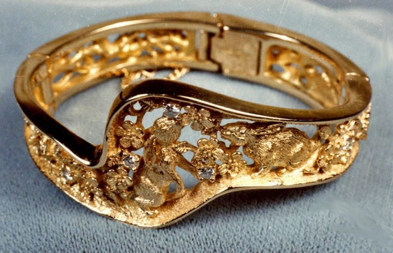 Bunny bracelet in 18k with flowers and diamonds by George Postgate
