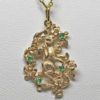 Bunny in the garden pendant emeralds