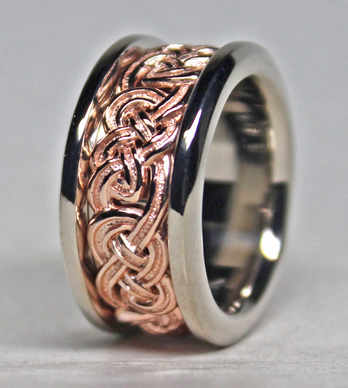Celtic Eternity knot band in 14K rose and white gold by George Postgate