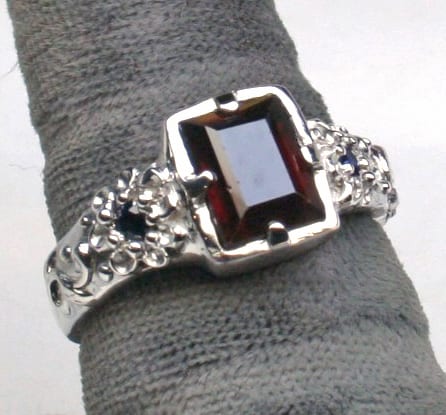 Garnet and sapphire sterling flower ring by Suzan Postgate
