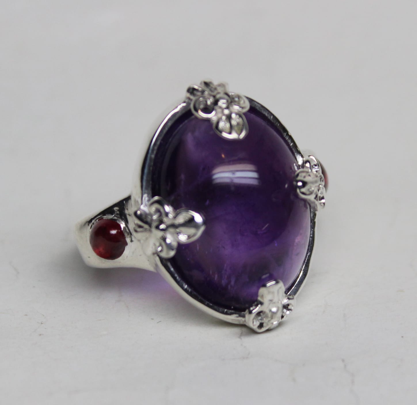 Amethyst and ruby cabochon ring in sterling silver by Suzan Postgate
