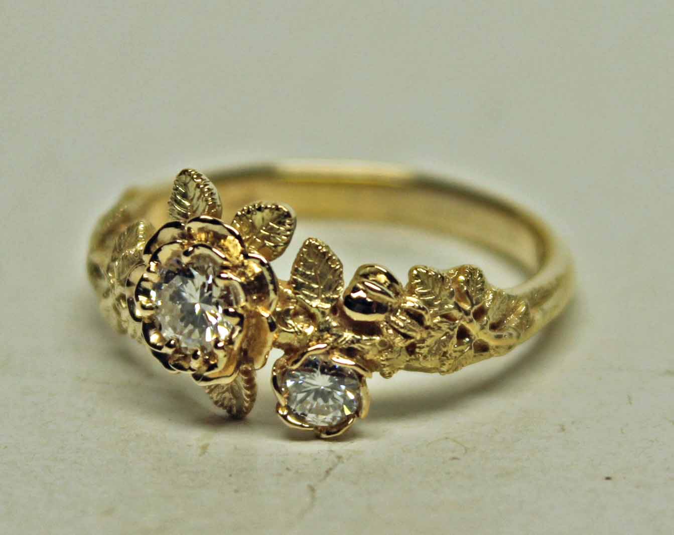 Two diamond rose ring in 18K by George Postgate