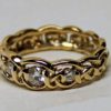 Celtic diamond wedding band in 18k with three fine natural diamonds size 6 1/2