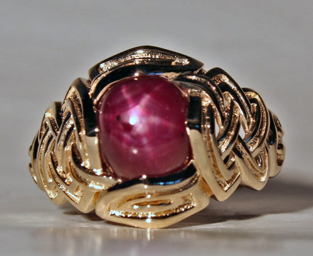 Mans Celtic star ruby open knot work ring in 14K by George Postgate