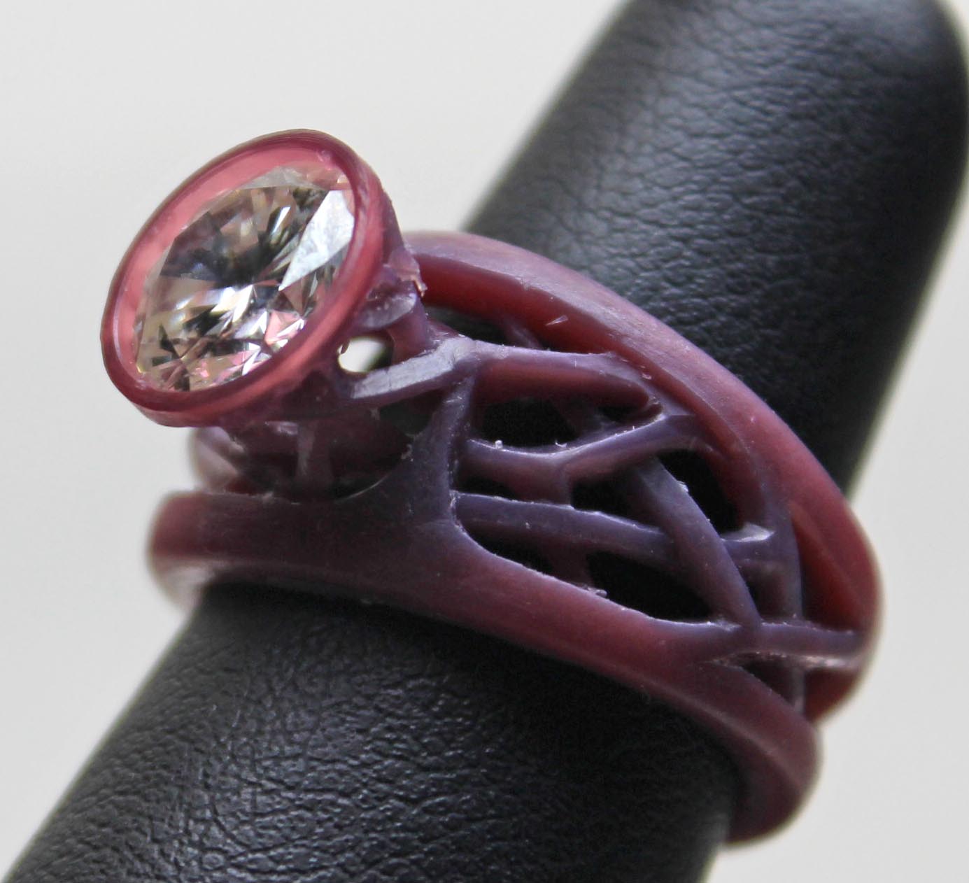 Sculptural lattice-work setting for diamond in wax by George Postgate