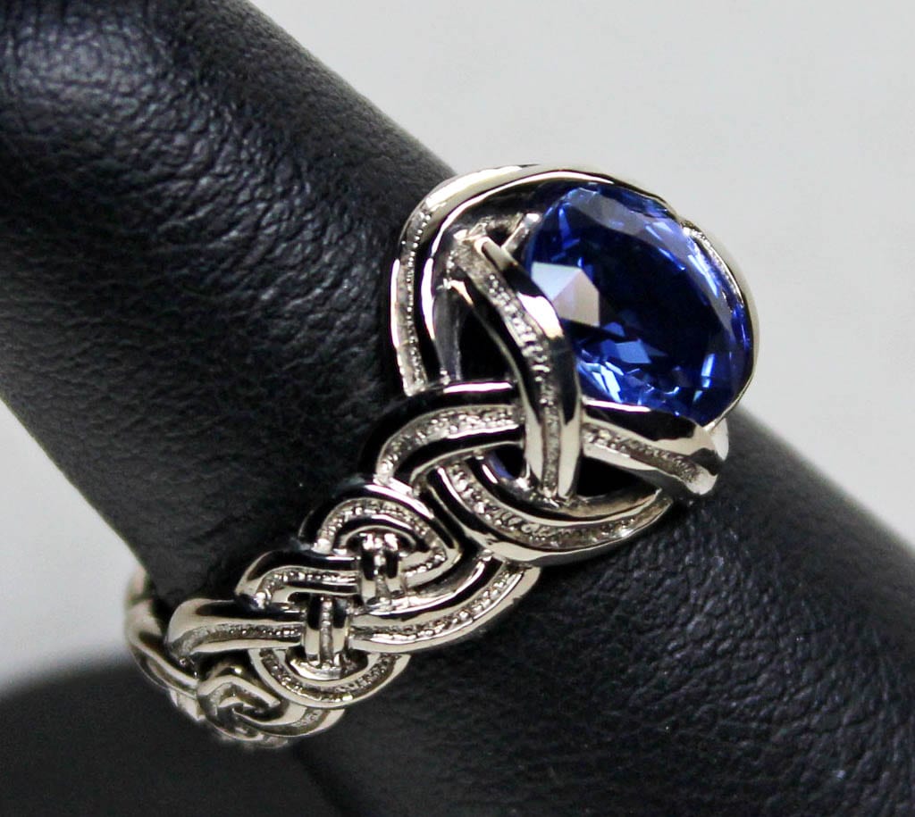white 14K with fine Ceylon sapphire, by George Postgate