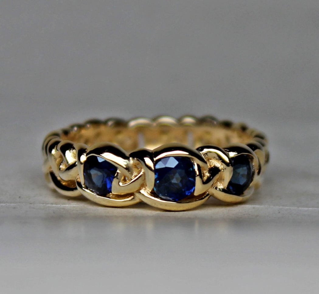 18K with three fine sapphires by George Postgate