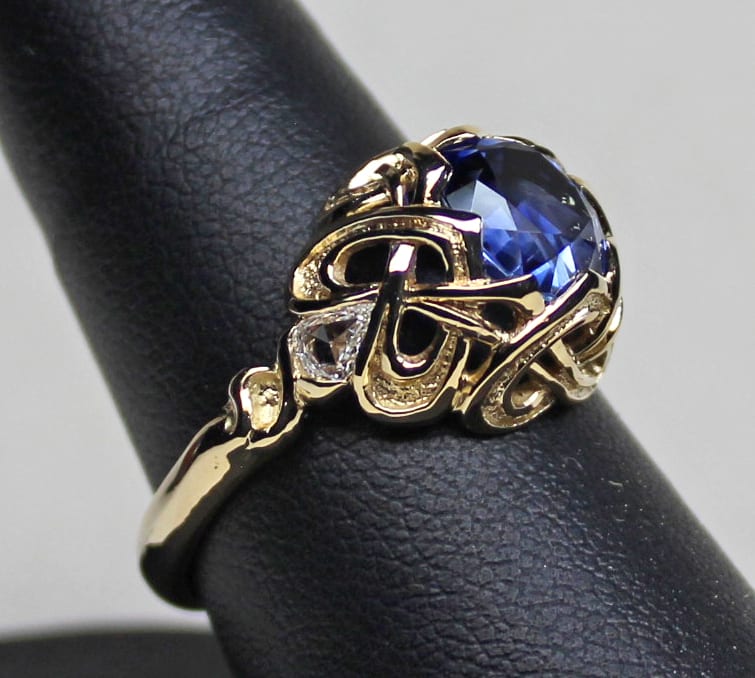 Celtic knot aquamarine and diamond ring in 18K by George Postgate