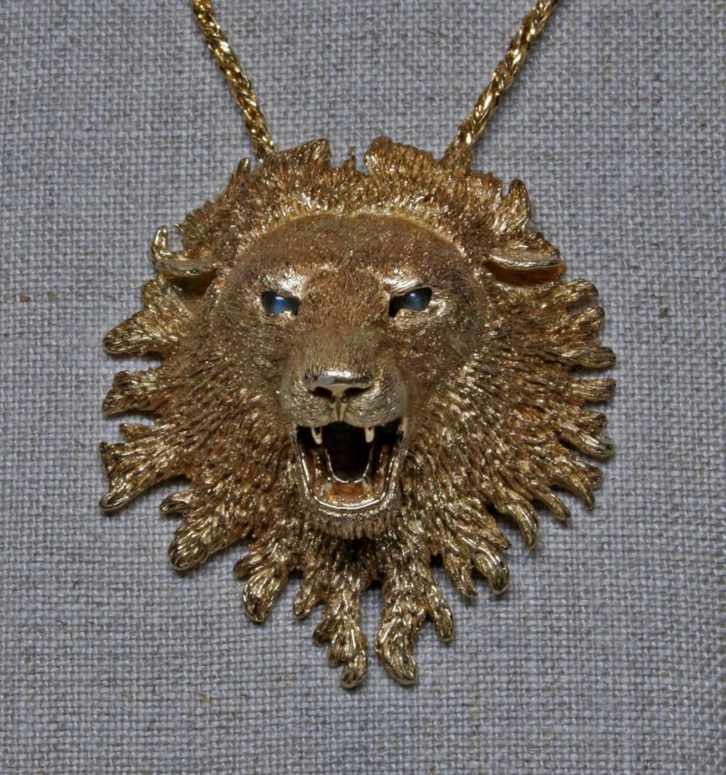 Large lion's head pendant by George