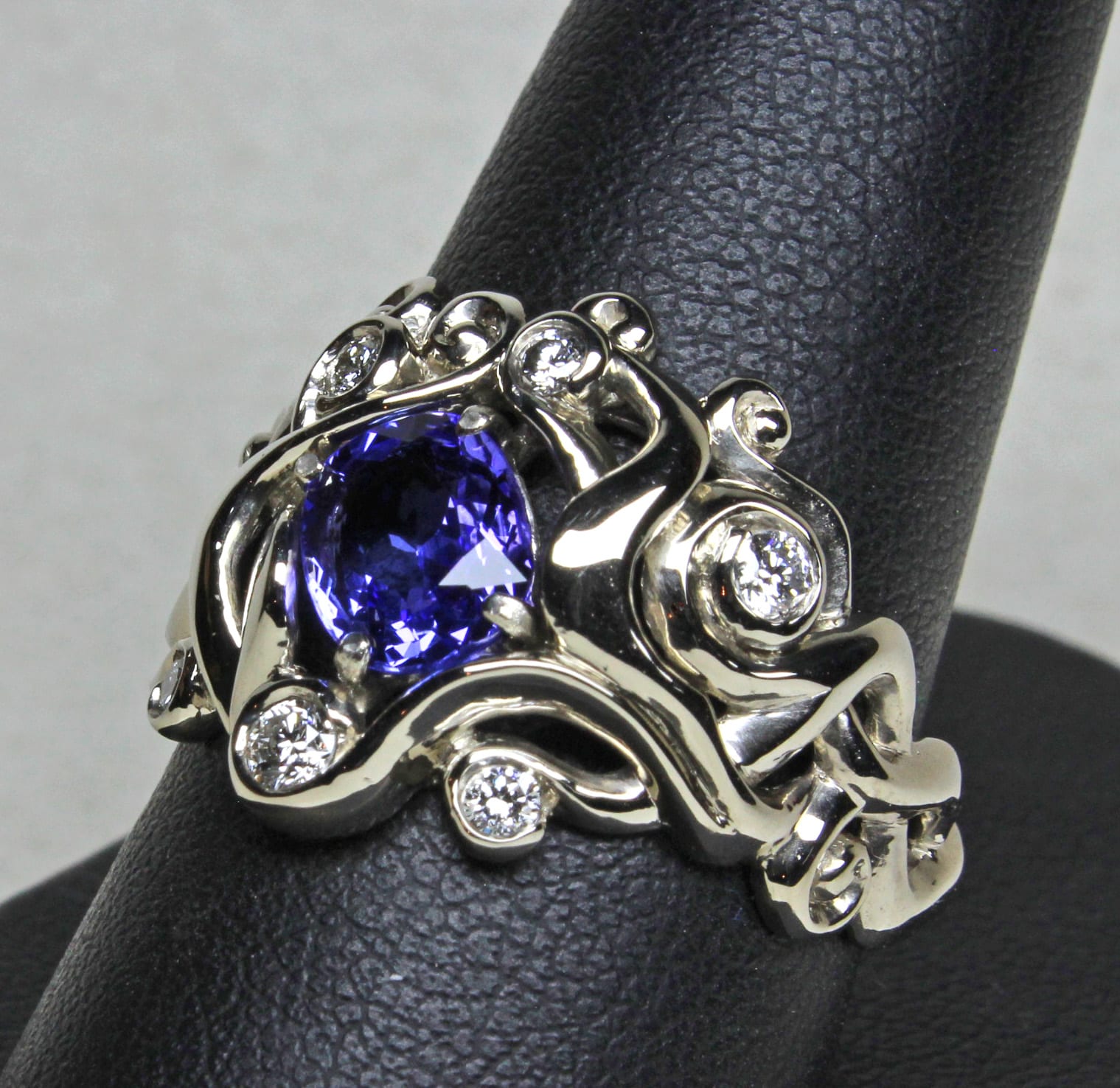 14K White gold Celtic Nouveau setting with tanzanite and diamonds by George Postgate