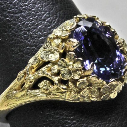 Tanzanite flower ring in 18K by George Postgate