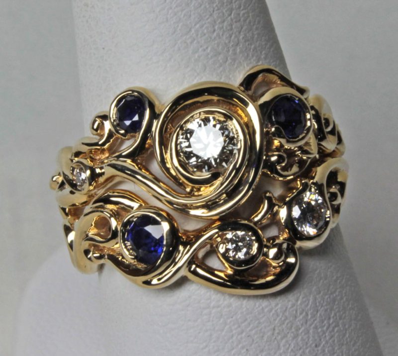 Swirl Wedding Ring set in 18K Gold Sapphires and Diamonds Size 6