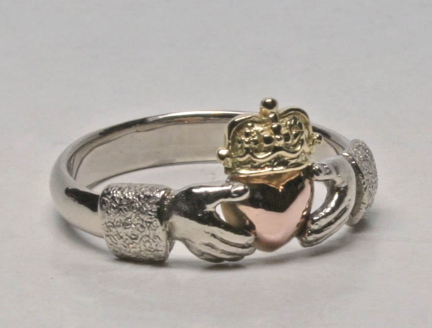 Irish claddagh ring in three colors of gold by George Postgate