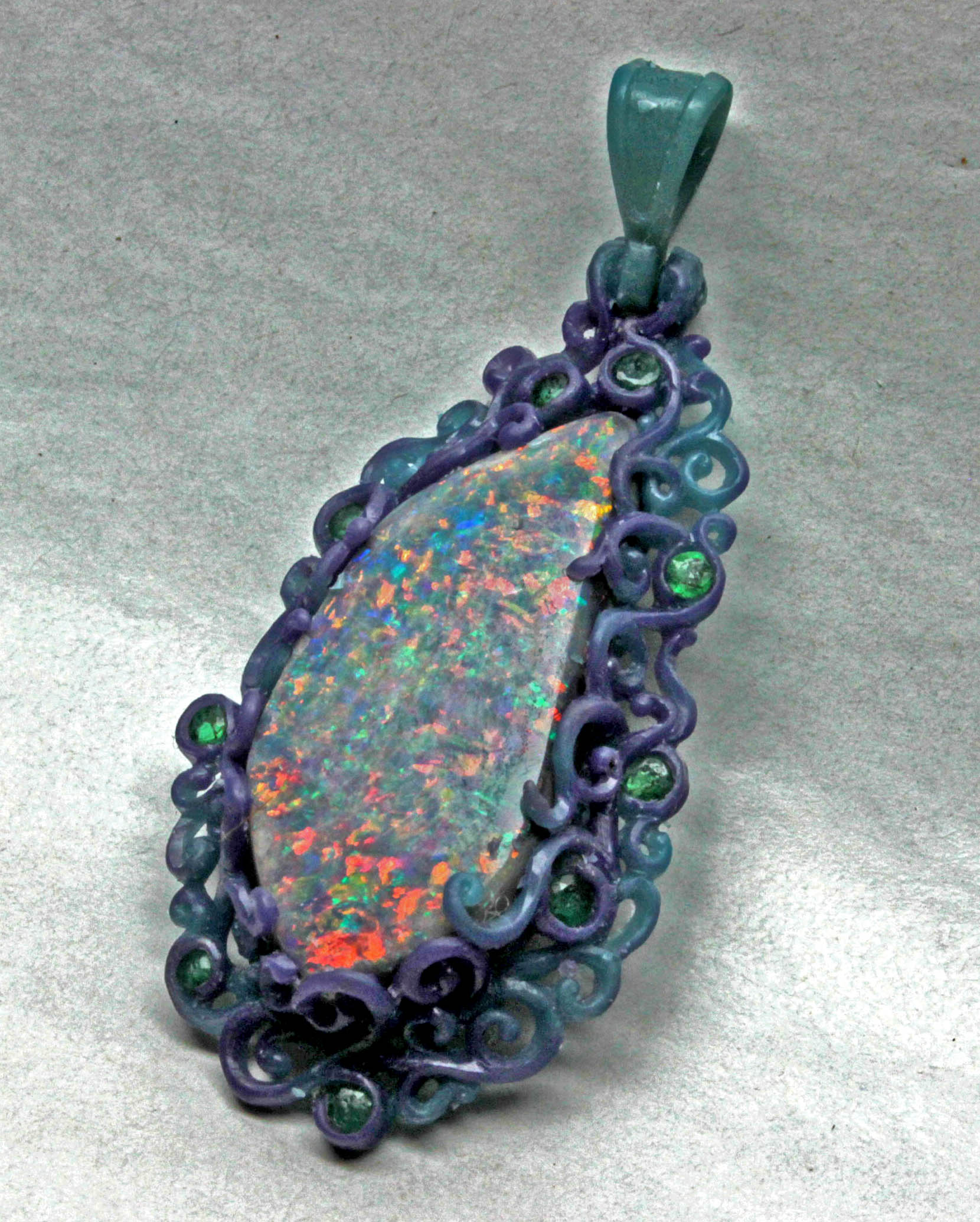 The wax of the Lacy setting for an Australian black opal from Lightning Ridge,