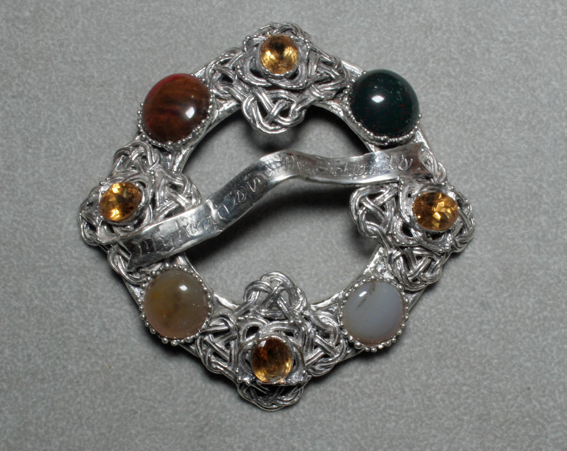 Scottish sterling silver broach with semi precious stones, by Suzan Postgate