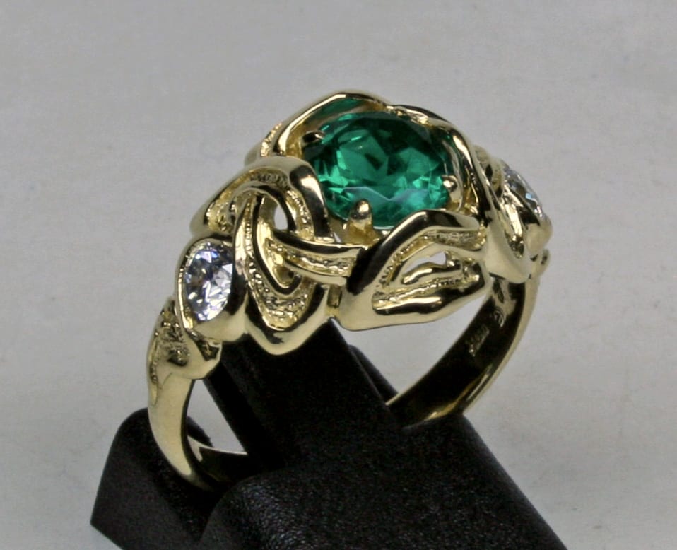 Celtic Nouveau three stone 18K knot setting for emerald and two diamonds by George Postgate