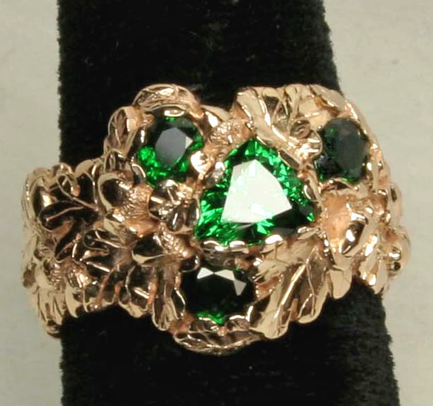 Oak leaf ring with tsavorites in 18K by George Postgate