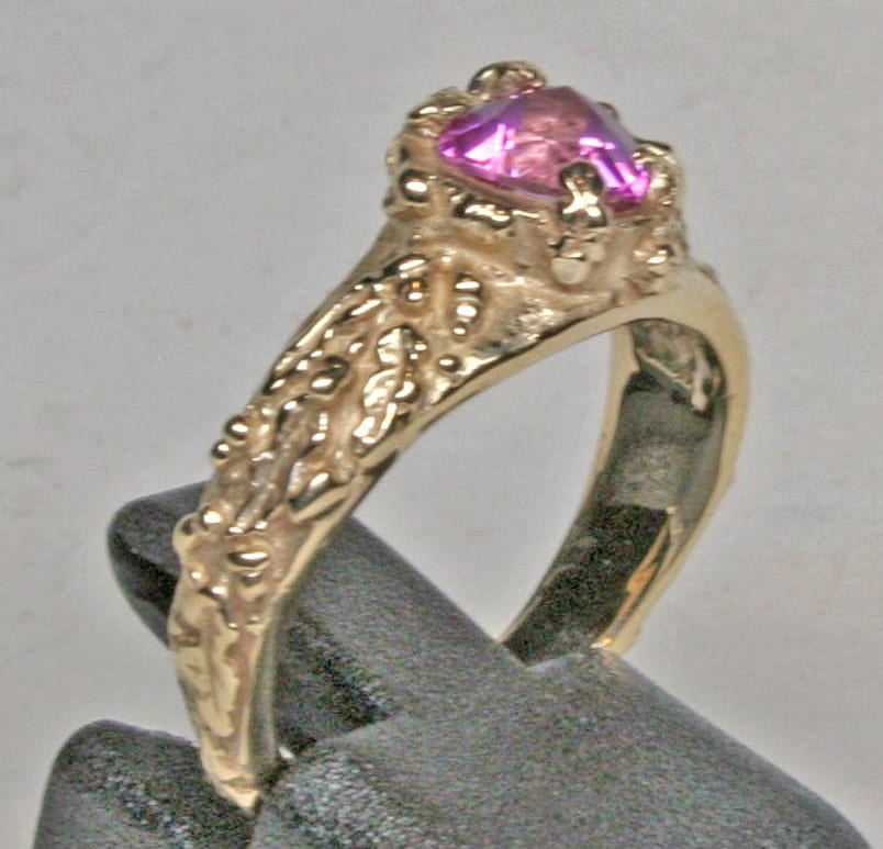 Oak leaf setting in 14K with heart shaped pink sapphire by Suzan Postgate
