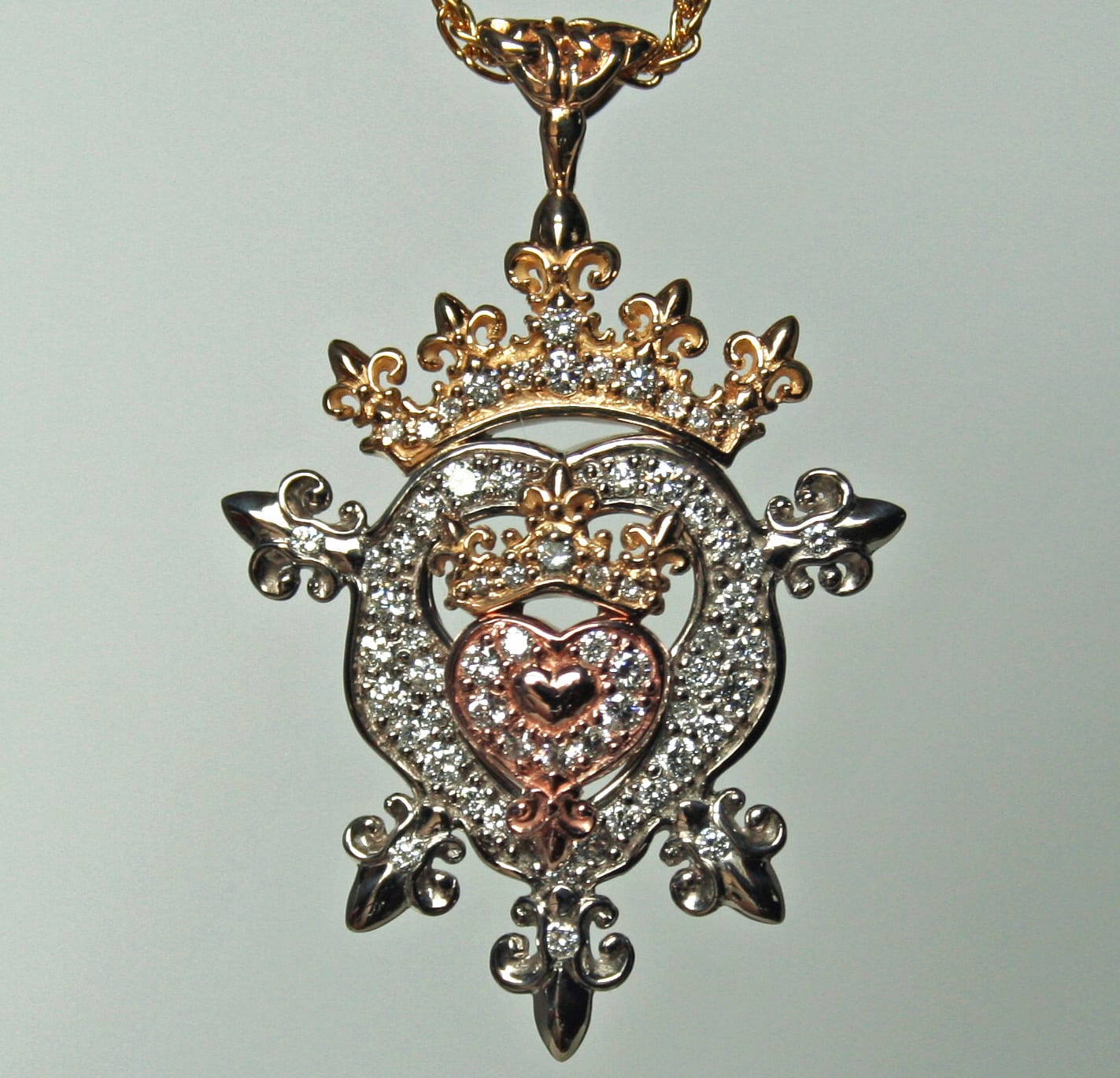 Scottish diamond pave luckenbooth pendant in three colors of gold set with diamonds by George Postgate