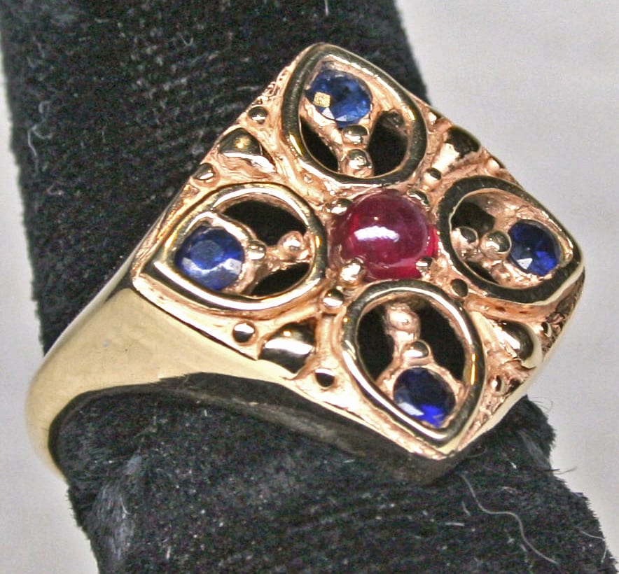 Tudor rose window ring in 14K with sapphires and ruby by Suzan Postgate