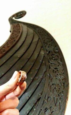 Viking gripping beast band