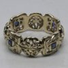 eight knot Celtic band with four sapphires by George Postgate