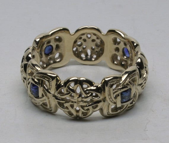 eight knot Celtic band with four sapphires by George Postgate