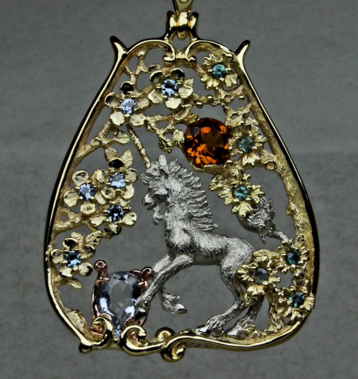 Unicorn Purifying Water Pendant in 18K Yellow, 14KPD White, and 14K Red golds. Chain not included.