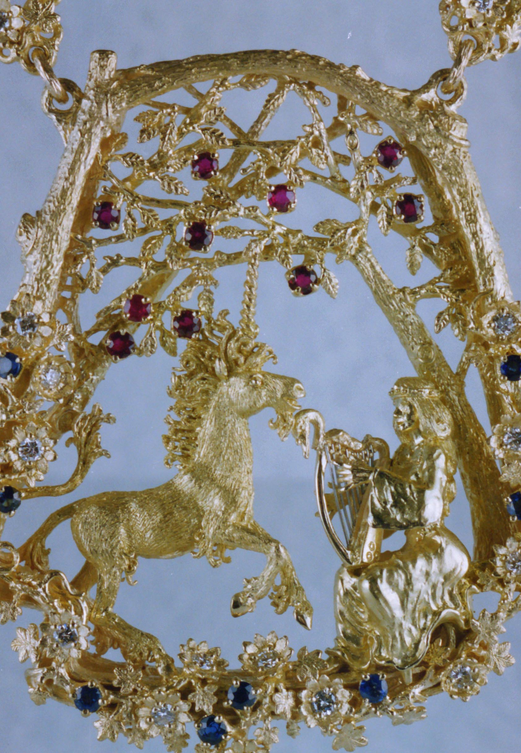 Unicorn and Maiden necklace in 18K, with diamonds, sapphires and rubies by, George Postgate.