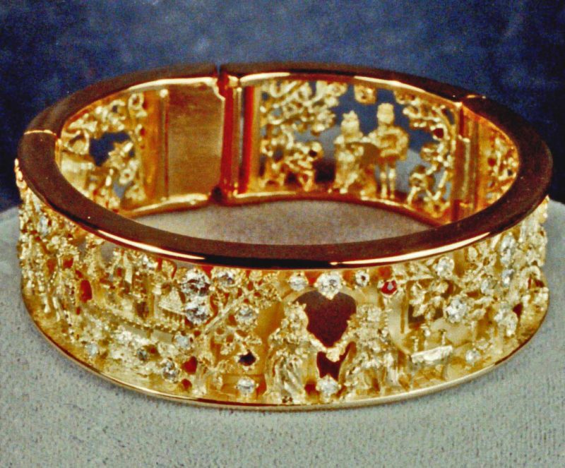 Beauty and the Beast Bracelet in 18K with diamonds, rubies, and sapphires by George Postgate