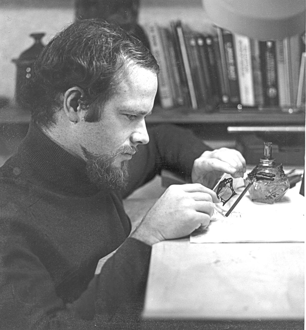 George Postgate working on the wax of an opal plique a jour pendant 1972