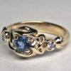 Celtic heart simple knot ring with sapphire and two diamonds. By George