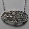 Highland deer pendant by Suzan Postgate in Sterling silver