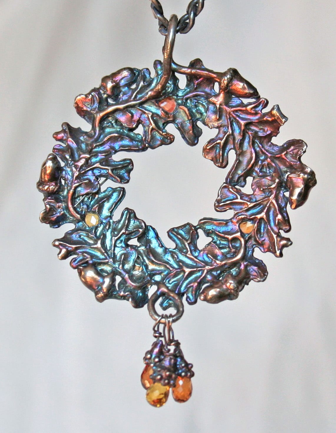 Oak leaf pendant in Sterling silver set with fancy sapphires by Suzan Postgate