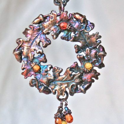 Oak leaf pendant in Sterling silver set with fancy sapphires by Suzan Postgate