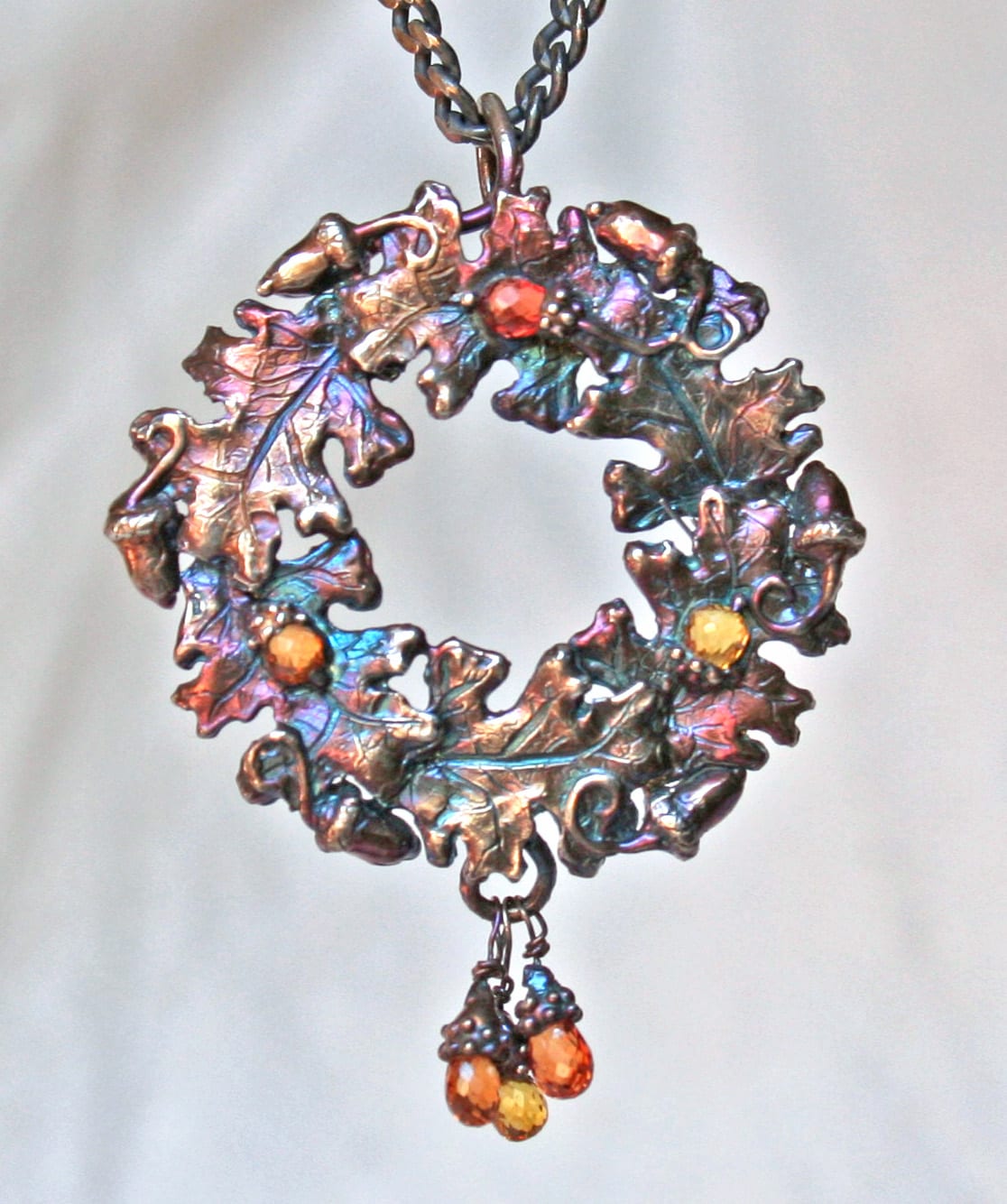 Oak leaf pendant in Sterling silver set with fancy sapphires by Suzan Postgate