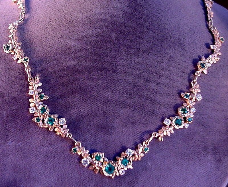 special order Gold Rose necklace with diamonds and emeralds by George Postgate