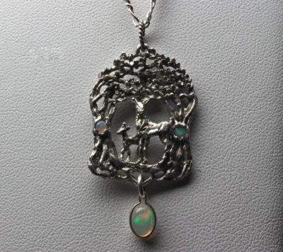 Doe and fawn in the woods opal pendant in Sterling silver by Suzan Postgate.