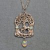 Doe and fawn in the woods opal pendant in Sterling silver by Suzan Postgate.