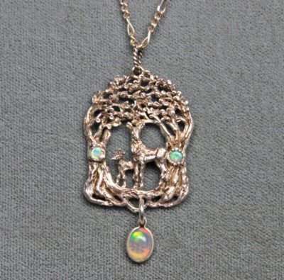 Doe and fawn in the woods opal pendant in Sterling silver by Suzan Postgate.