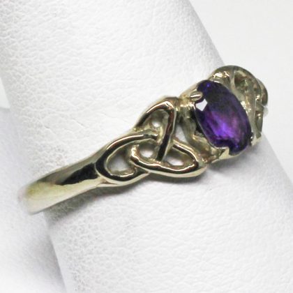 Celtic purple sapphire ring in white gold