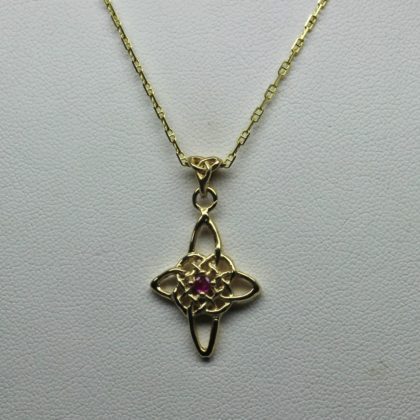 Celtic star knot cross with pink sapphire