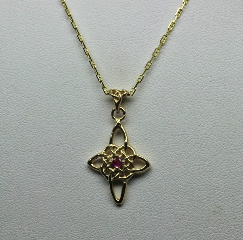 Celtic star knot cross with pink sapphire