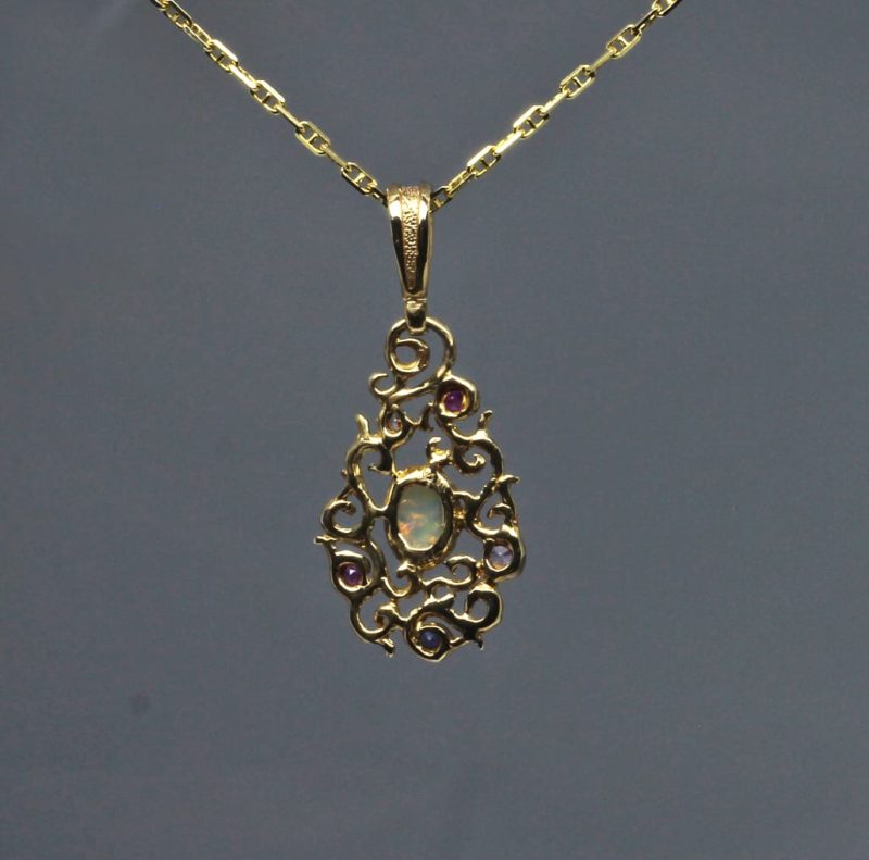 Curvilinear Pendant with sapphire ruby and opal in 14K by Suzan