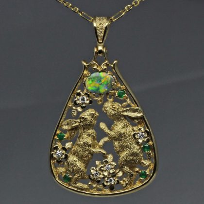 Dancing Bunnies opal pendant in 14K with emeralds and diamonds by George