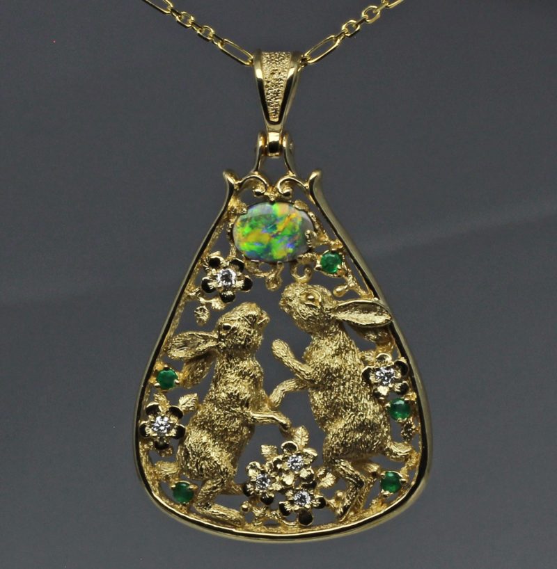 Dancing Bunnies opal pendant in 14K with emeralds and diamonds by George