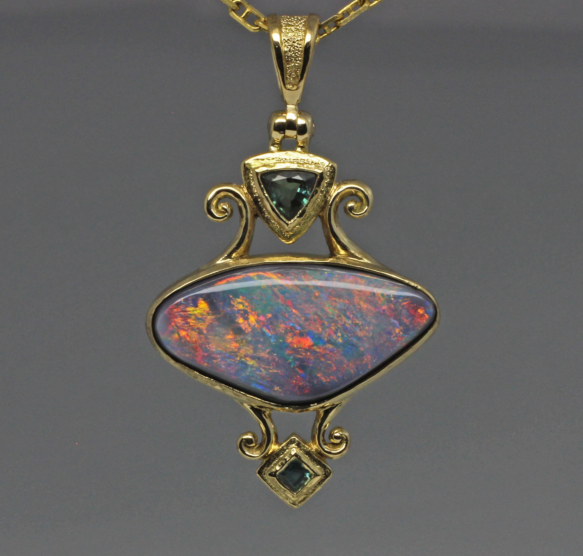 Black opal and Russian alexandrite pendant, in 18k