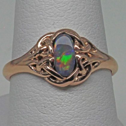 Celtic black opal rose gold ring