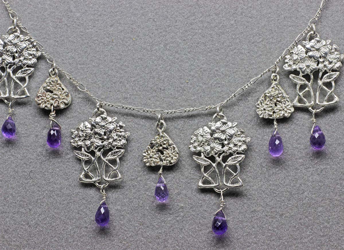 Magnolia and flower Mackintosh necklace